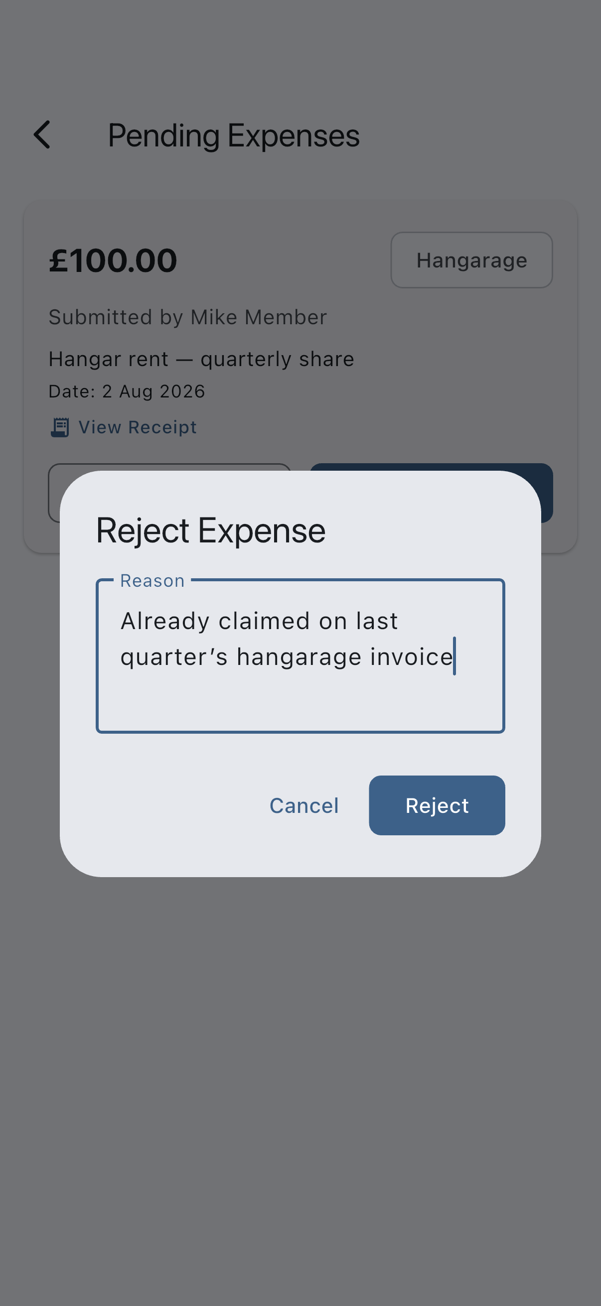 The Reject Expense dialog with a reason typed into the Reason field, above the Cancel and Reject buttons