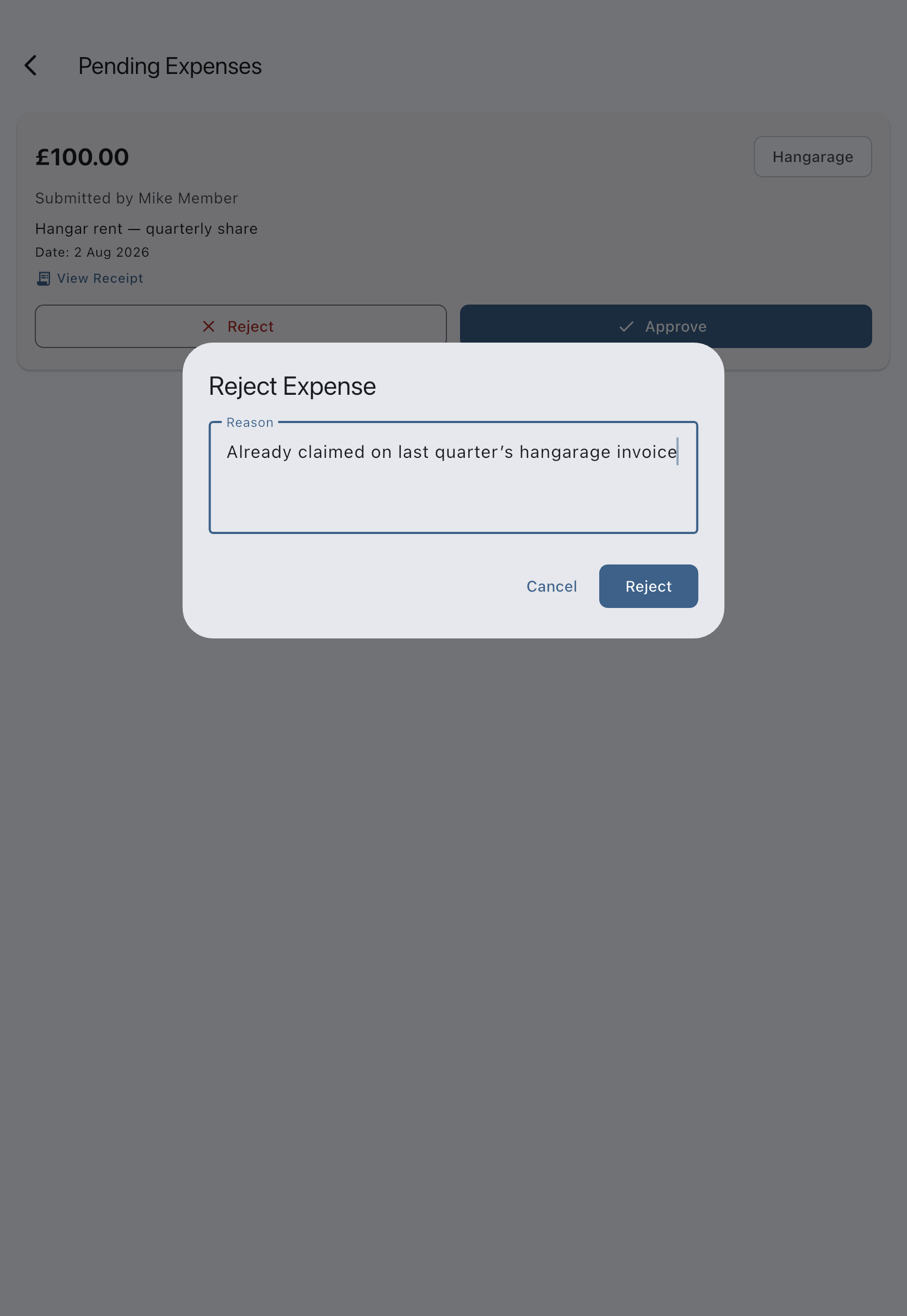 The Reject Expense dialog with a reason typed into the Reason field, above the Cancel and Reject buttons