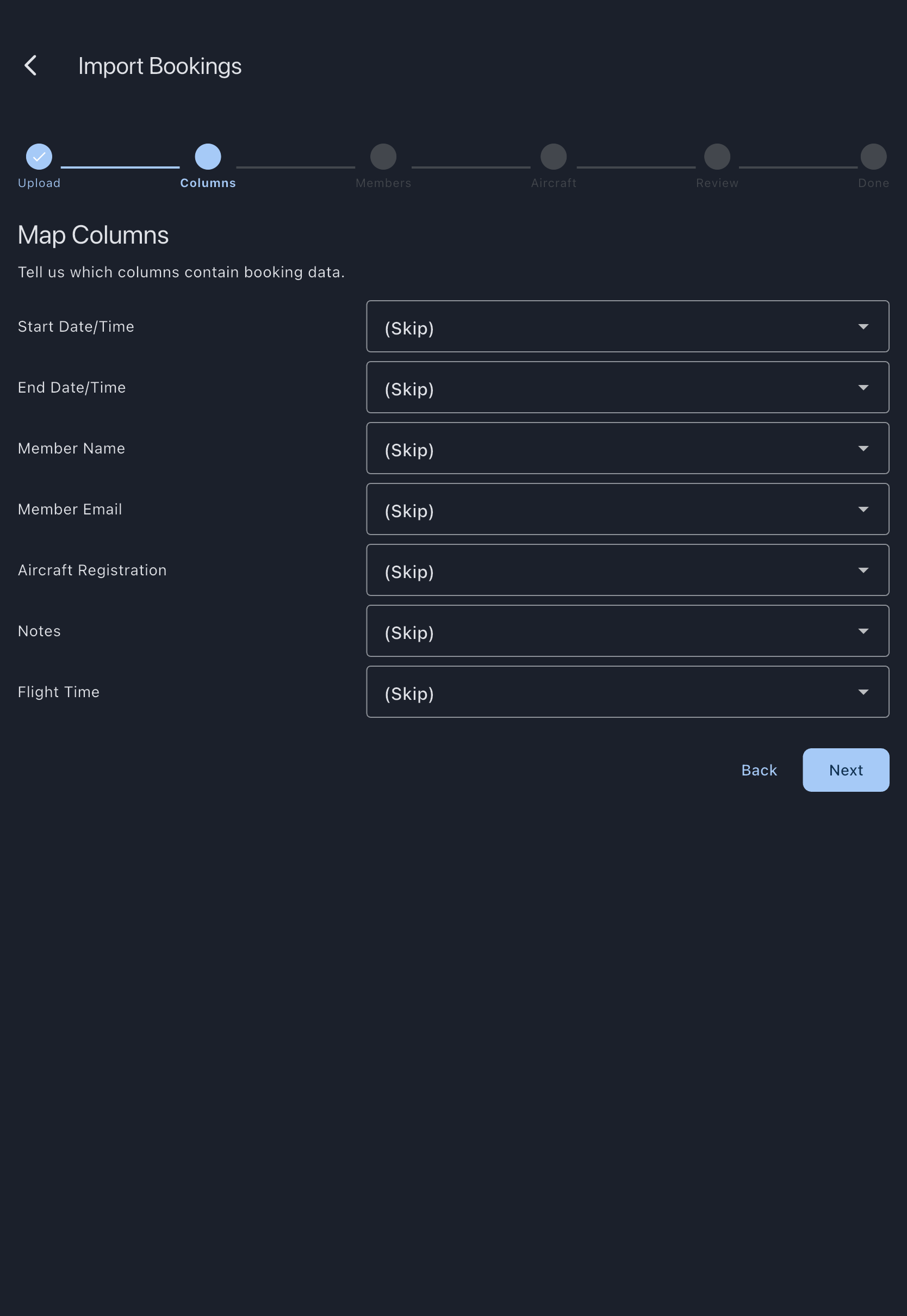 The Map Columns step of the import wizard, with the six-dot step indicator above a row per Syndik8 field, each paired with a dropdown listing the columns found in the uploaded CSV