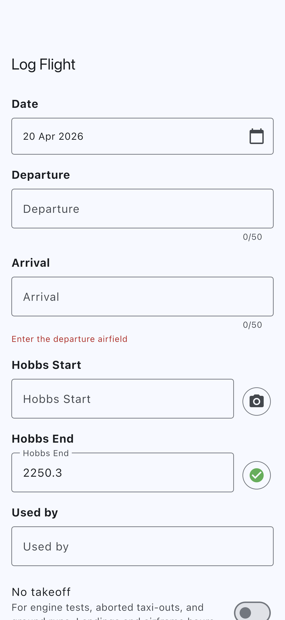 Log Flight form with a green confirmation tick next to the Hobbs End field, showing the meter photo is attached and ready to upload
