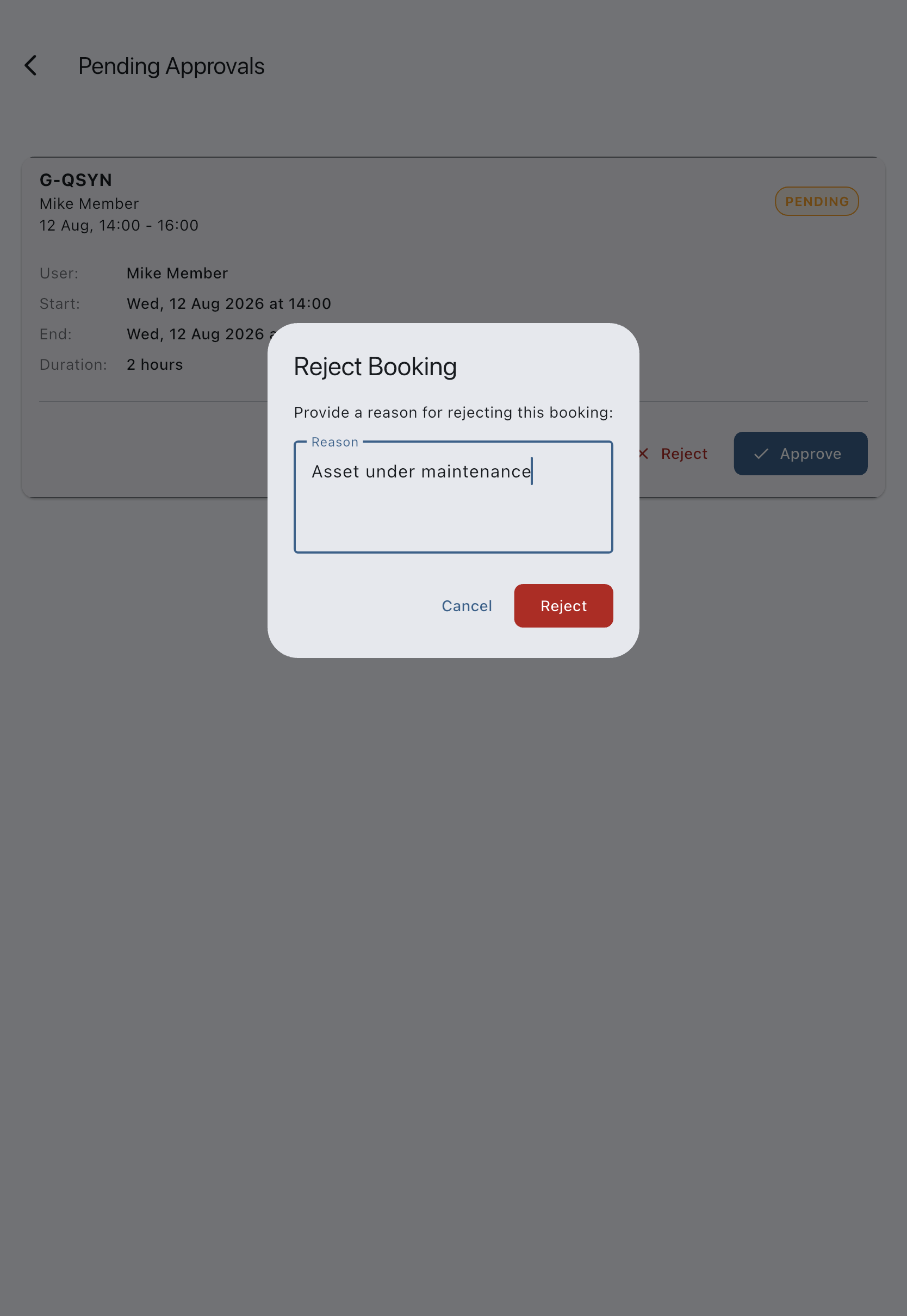 The reject dialog over the Pending Approvals list, with a short reason typed into the reason field and the Reject button enabled