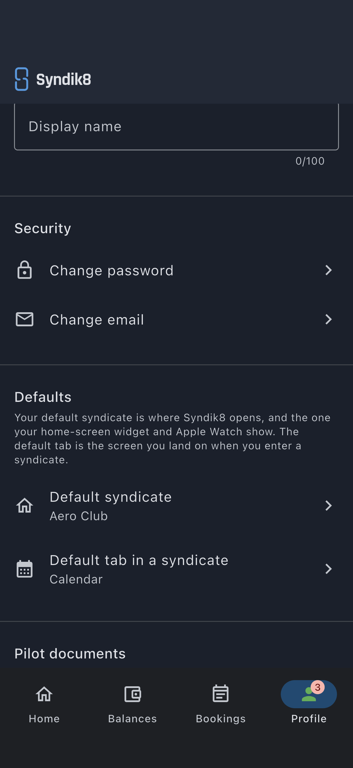 The Defaults card on the Profile screen, with its explainer above the Default syndicate and Default tab in a syndicate rows, and no Favourite asset row beneath them