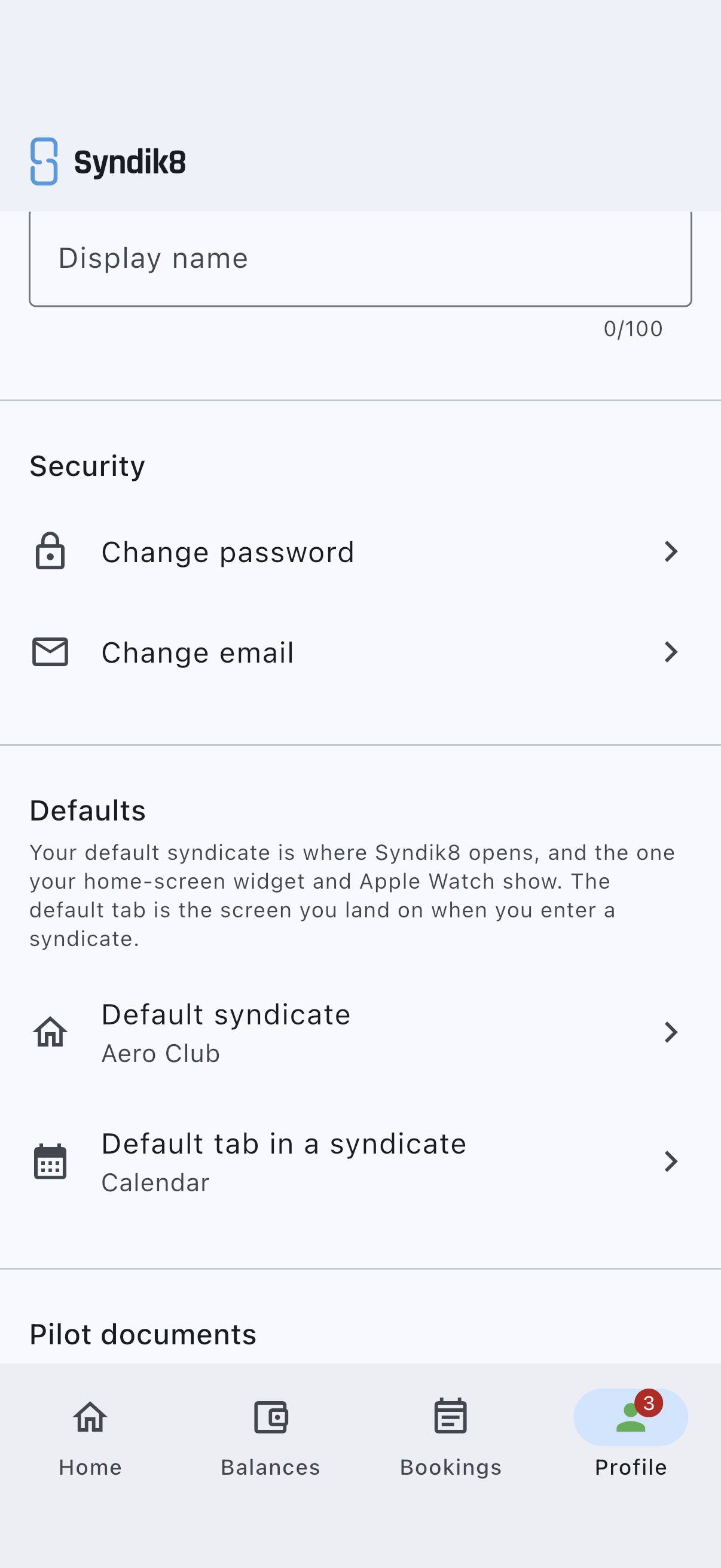 The Defaults card on the Profile screen, with its explainer above the Default syndicate and Default tab in a syndicate rows, and no Favourite asset row beneath them