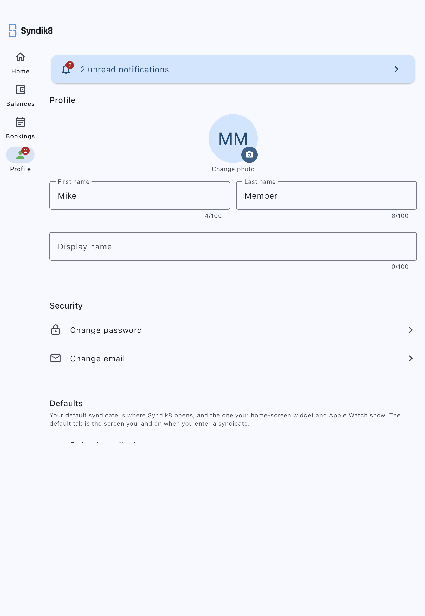 The Defaults card on the Profile screen, with its explainer above the Default syndicate and Default tab in a syndicate rows, and no Favourite asset row beneath them